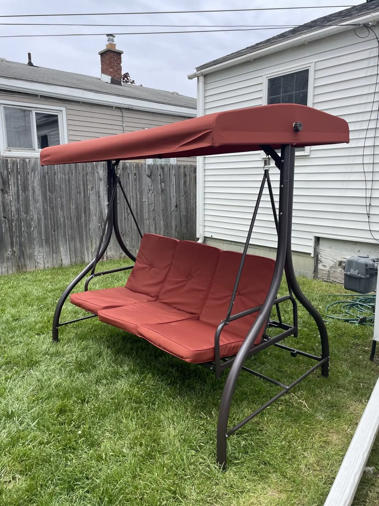 Customer photo — garden swing on patio